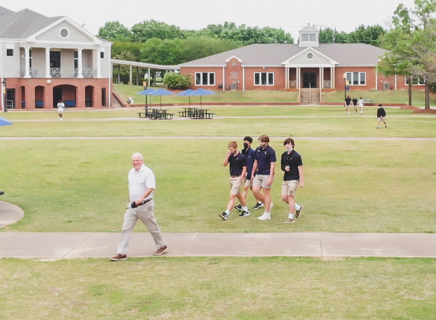 Students Walking Across Campus