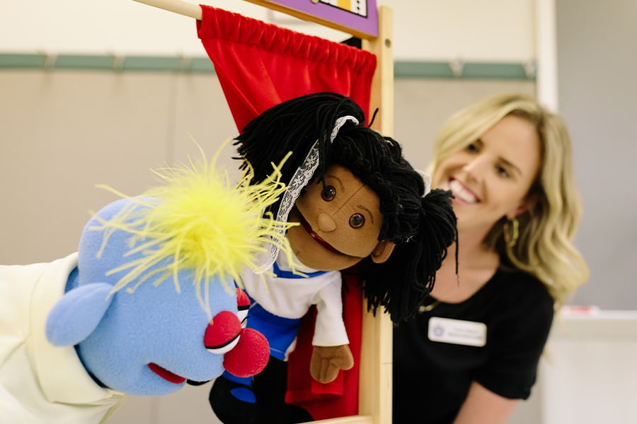 Teacher with puppets
