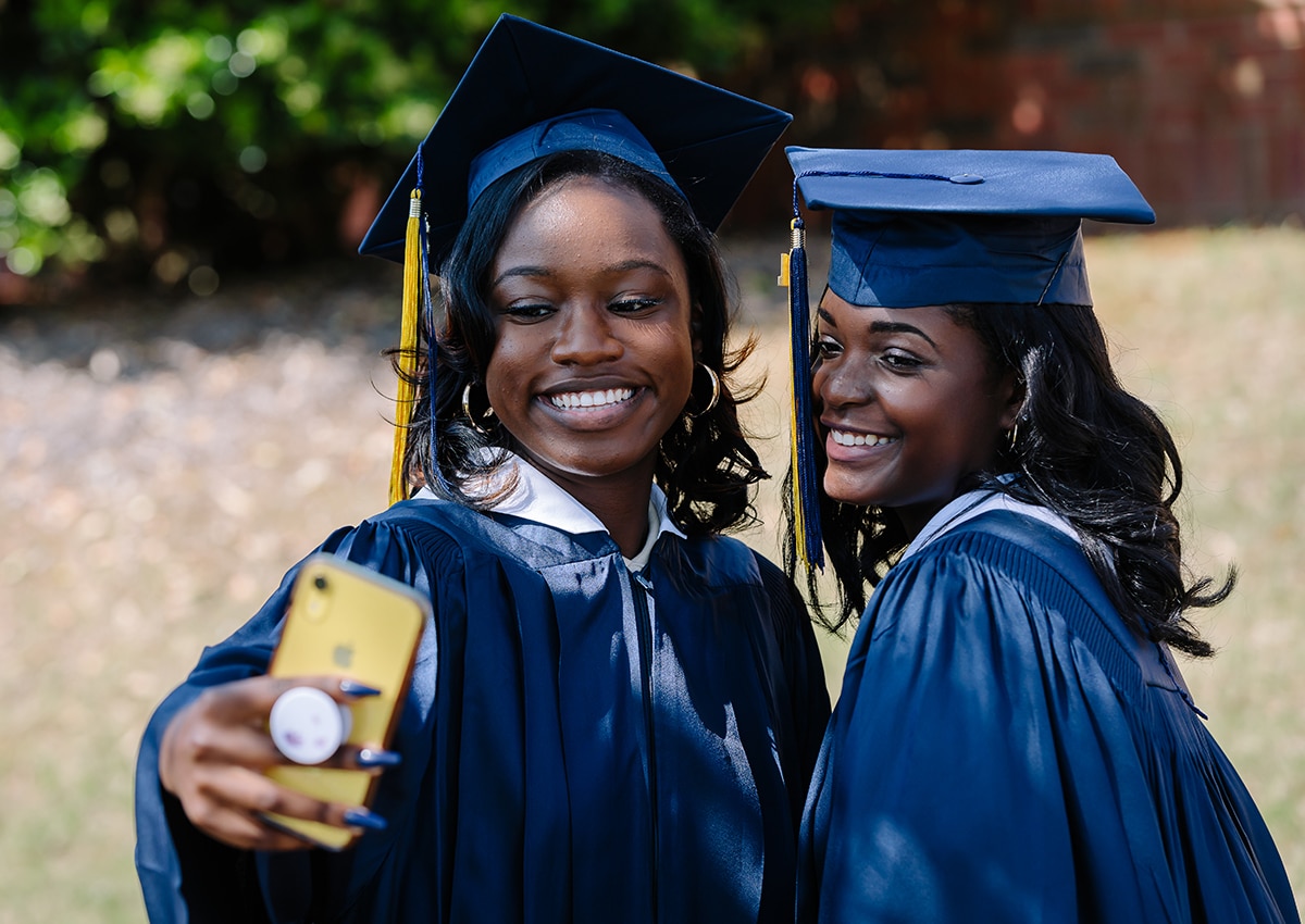 Two Graduates Taking A Selfie