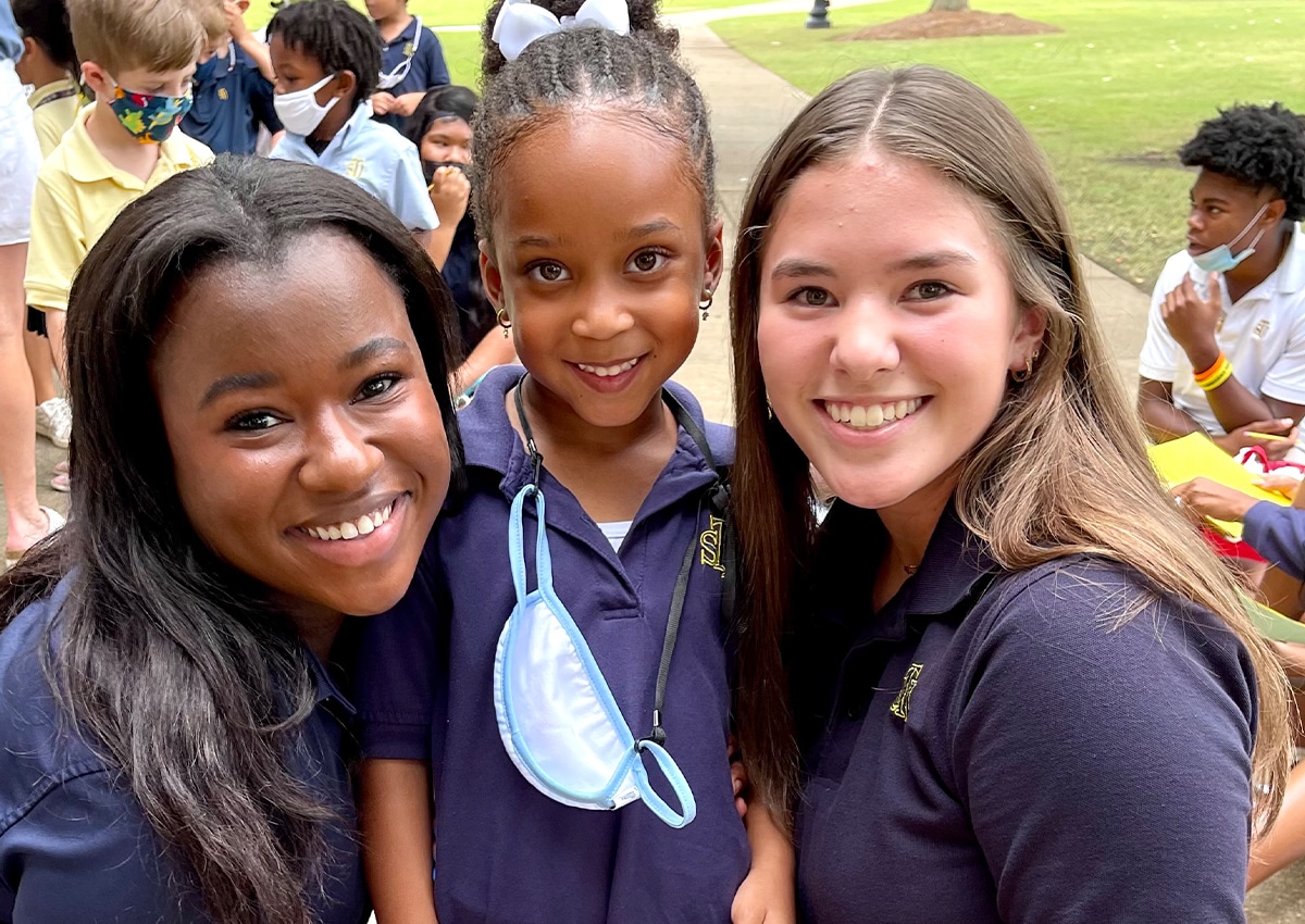 Three Students Smiling Together