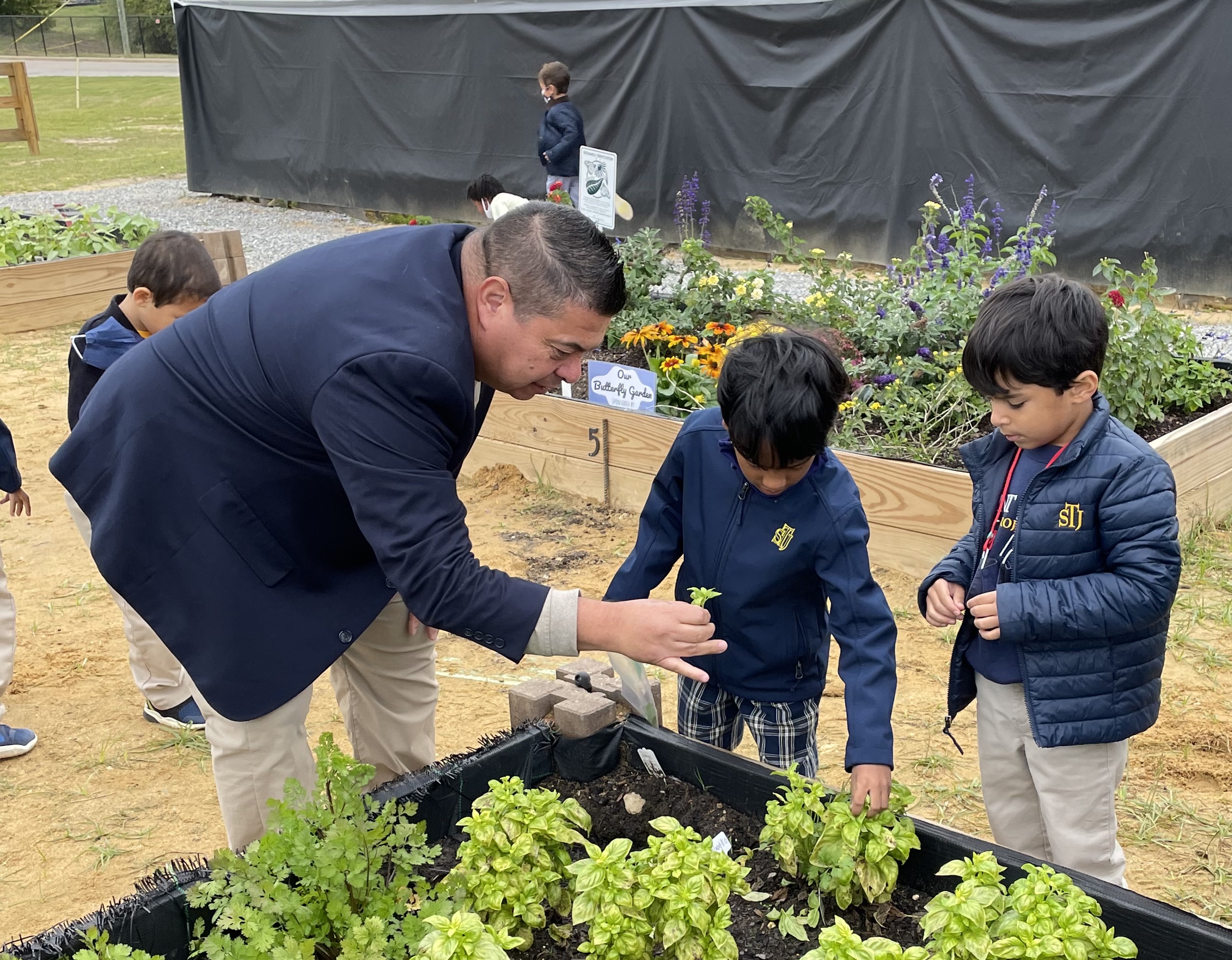 students admiring the garden